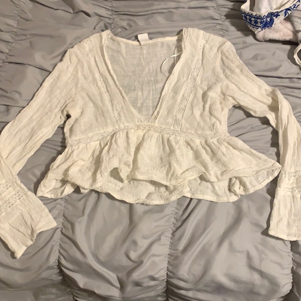 Cropped long sleeve top